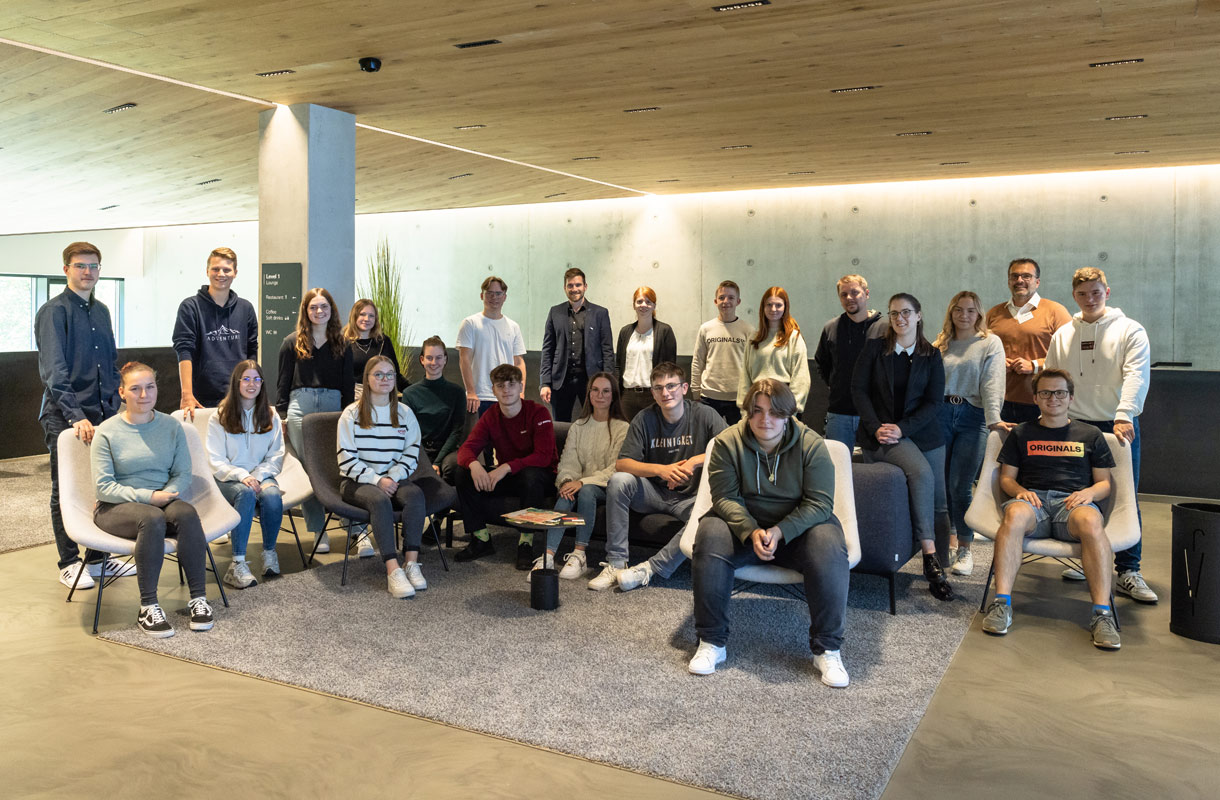 Group Photo in Modern Office Setting Group Photo in Modern Office Setting