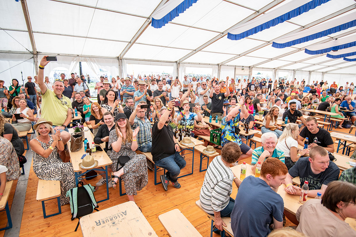 Community Event in Large Tent Gathering